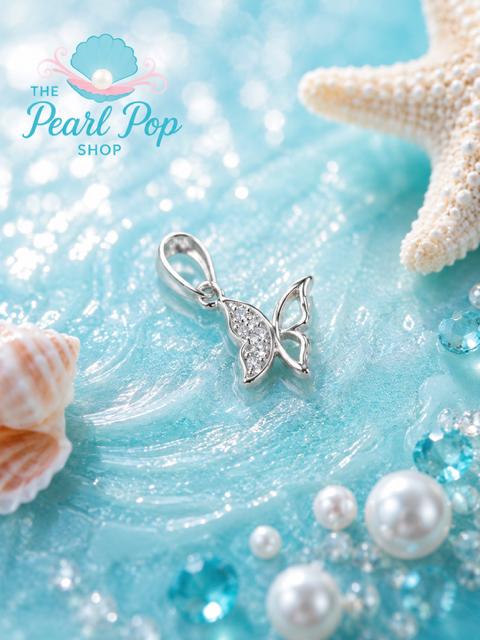 Sterling silver butterfly pendant with pearl on a beach background with starfish